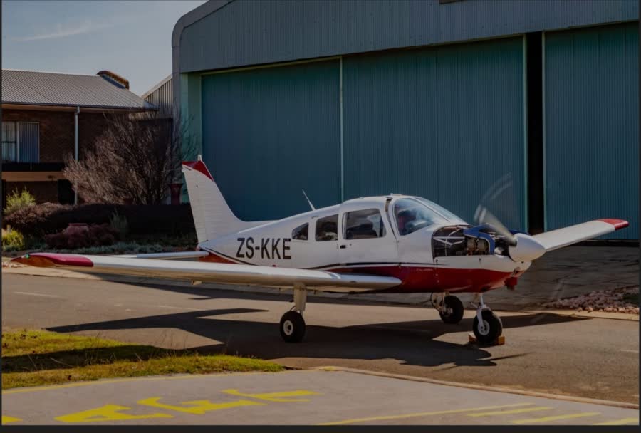 Piper training aircraft outside the hangar